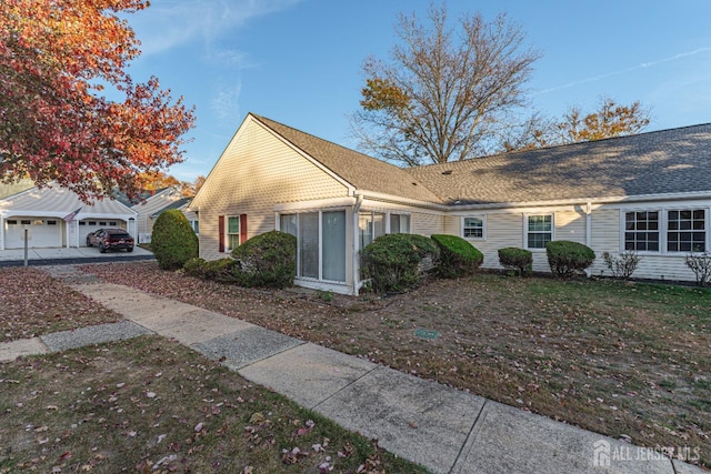 ranch-style home with a garage