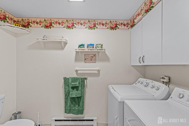 laundry area featuring independent washer and dryer and baseboard heating