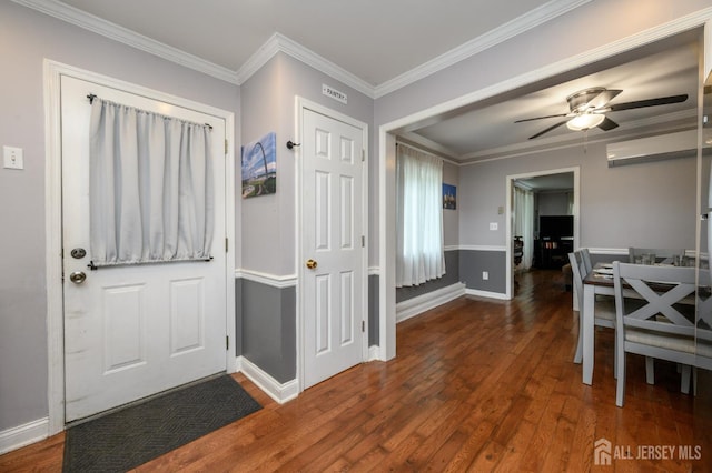 439 Old Main St, Franklin, NJ 08802 - foyer entrance featuring wood finished floors, ceiling fan, crown molding, and a wall unit AC