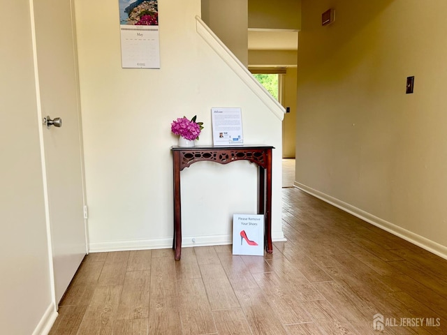 4424 Sayre Dr, Plainsboro, NJ 08540 - hallway with wood finished floors and baseboards
