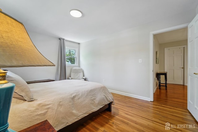 35 Poet Dr, Matawan, NJ 07747 - bedroom with wood finished floors and baseboards