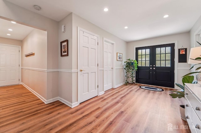 35 Poet Dr, Matawan, NJ 07747 - entrance foyer featuring wood finished floors, french doors, and recessed lighting