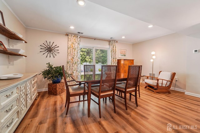 35 Poet Dr, Matawan, NJ 07747 - dining space featuring light wood finished floors, recessed lighting, and crown molding