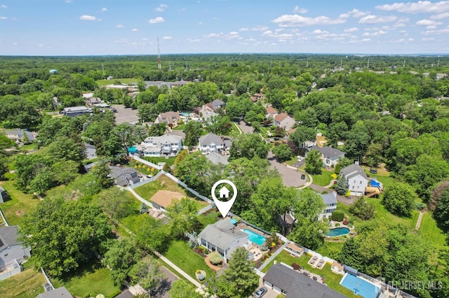 35 Poet Dr, Matawan, NJ 07747 - aerial view of residential area featuring a forest and a pool