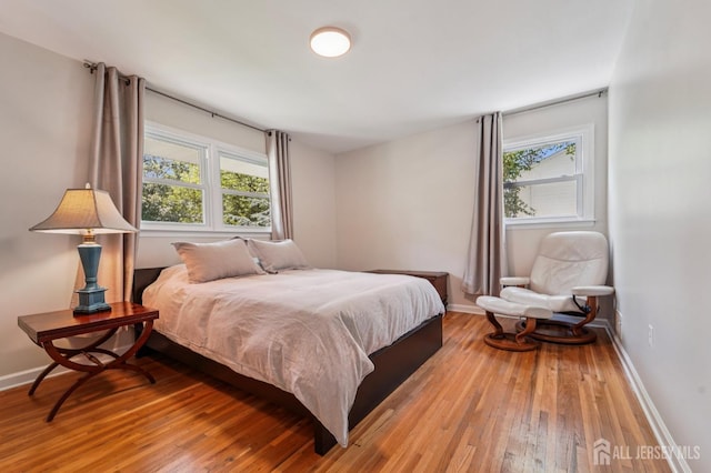 35 Poet Dr, Matawan, NJ 07747 - bedroom featuring multiple windows and light wood-style floors