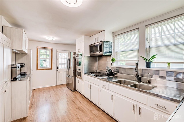 1072 Salem Ave, Hillside, NJ 07205 - kitchen with appliances with stainless steel finishes, stainless steel countertops, and plenty of natural light