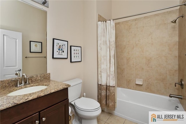 full bathroom with tile patterned floors, toilet, shower / tub combo, and vanity