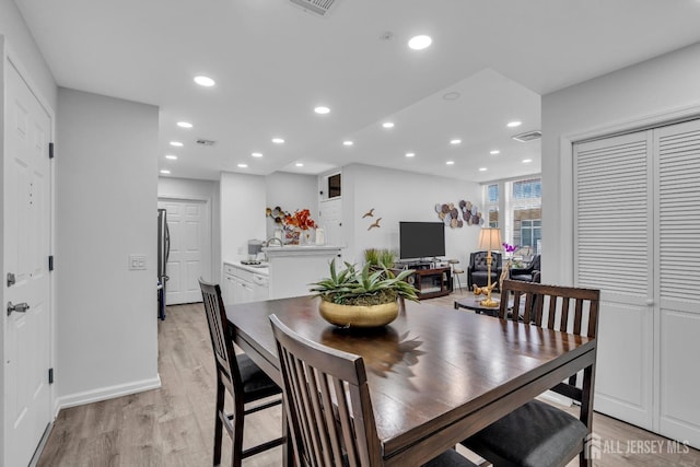 358 Rector St Unit 218, Perth Amboy, NJ 08861 - dining area with light wood finished floors, baseboards, visible vents, and recessed lighting