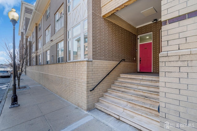 358 Rector St Unit 218, Perth Amboy, NJ 08861 - view of exterior entry with brick siding