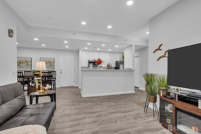 358 Rector St Unit 218, Perth Amboy, NJ 08861 - living area with baseboards, light wood-style floors, and recessed lighting
