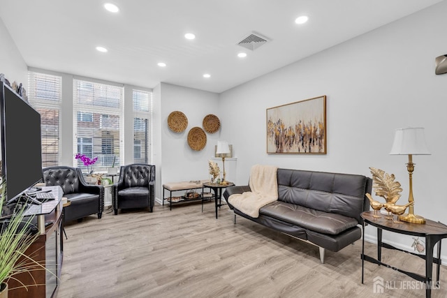 358 Rector St Unit 218, Perth Amboy, NJ 08861 - living area with baseboards, light wood-style flooring, visible vents, and recessed lighting