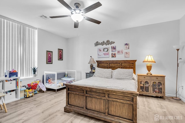 358 Rector St Unit 218, Perth Amboy, NJ 08861 - bedroom with light wood-style flooring, visible vents, and a ceiling fan