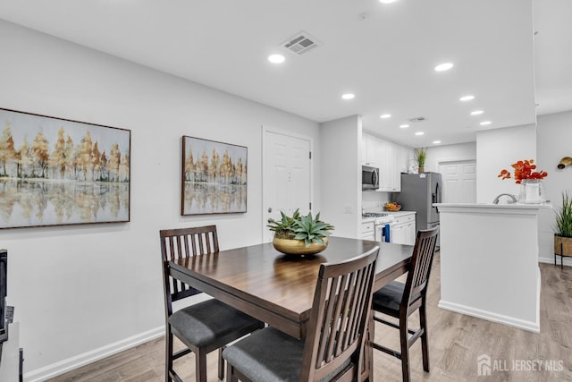 358 Rector St Unit 218, Perth Amboy, NJ 08861 - dining space with recessed lighting, light wood-type flooring, visible vents, and baseboards