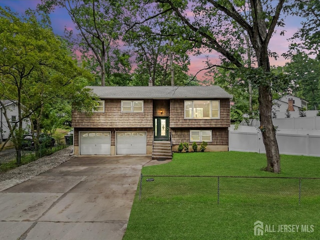 376 New Brunswick Ave, East Brunswick, NJ 08816 - bi-level home featuring concrete driveway and an attached garage