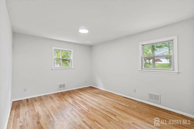 376 New Brunswick Ave, East Brunswick, NJ 08816 - spare room with wood finished floors and baseboards