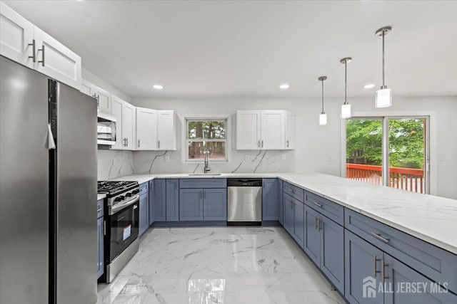 376 New Brunswick Ave, East Brunswick, NJ 08816 - kitchen featuring appliances with stainless steel finishes, recessed lighting, white cabinetry, tasteful backsplash, and light marble finish floors
