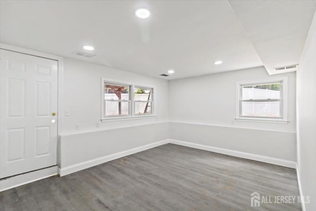 376 New Brunswick Ave, East Brunswick, NJ 08816 - spare room with wood finished floors and recessed lighting