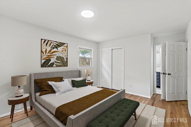 376 New Brunswick Ave, East Brunswick, NJ 08816 - bedroom featuring light wood-style floors and a closet