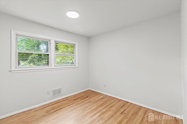 376 New Brunswick Ave, East Brunswick, NJ 08816 - unfurnished room featuring baseboards and wood finished floors