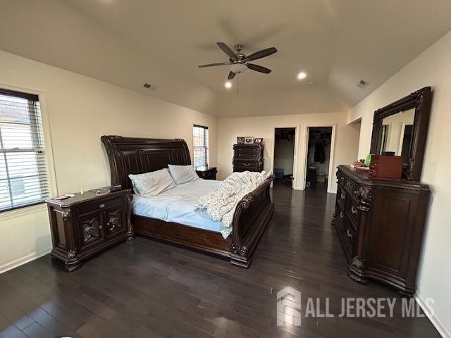 bedroom with dark wood-style flooring, baseboards, recessed lighting, and ceiling fan
