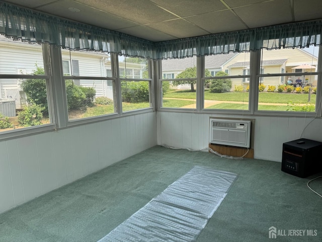177-C Rossmoor Dr Unit 177C, Monroe, NJ 08831 - unfurnished sunroom featuring a wall unit AC