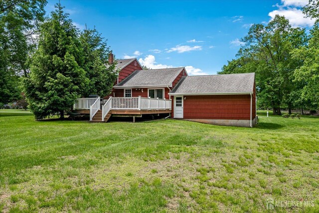200 Elwood St, Piscataway, NJ 08854 - back of property with a wooden deck and a lawn