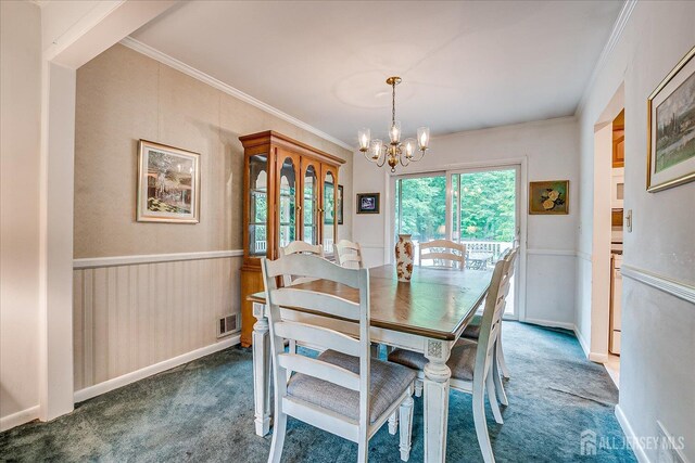 200 Elwood St, Piscataway, NJ 08854 - carpeted dining area featuring a chandelier and ornamental molding
