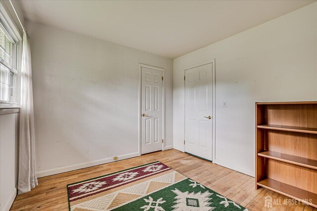 200 Elwood St, Piscataway, NJ 08854 - unfurnished room with wood finished floors and baseboards