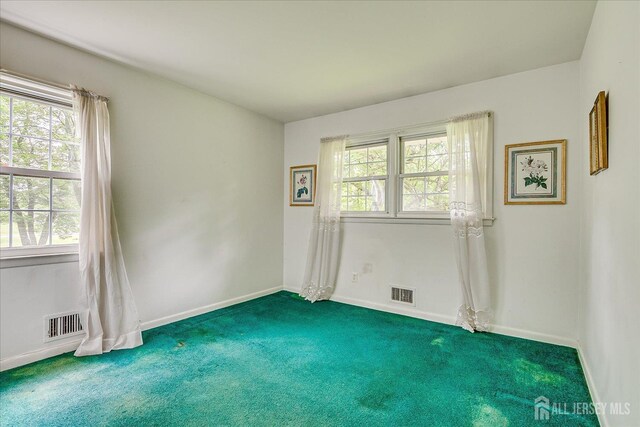 200 Elwood St, Piscataway, NJ 08854 - empty room featuring carpet floors and baseboards