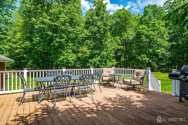 200 Elwood St, Piscataway, NJ 08854 - wooden terrace featuring outdoor dining area, a grill, and view of scattered trees