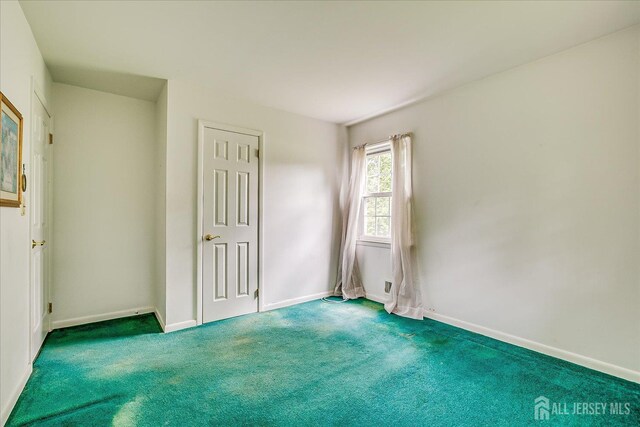 200 Elwood St, Piscataway, NJ 08854 - unfurnished bedroom with carpet floors and baseboards
