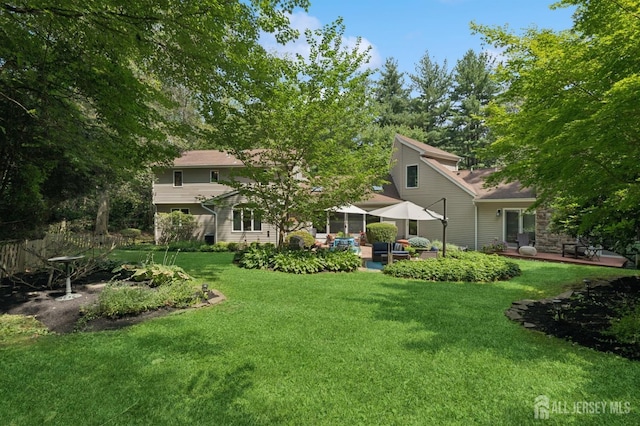 2 Derby Ln, East Brunswick, NJ 08816 - view of grassy yard featuring a patio area