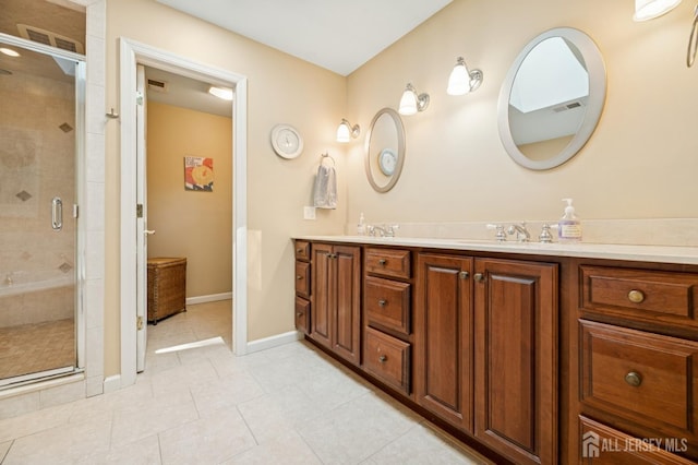 2 Derby Ln, East Brunswick, NJ 08816 - bathroom featuring double vanity, a shower stall, and tile patterned flooring