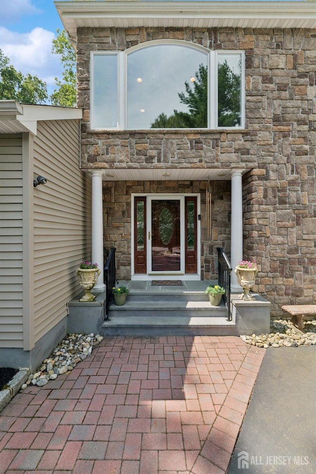 2 Derby Ln, East Brunswick, NJ 08816 - property entrance with stone siding