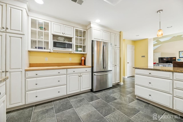 2 Derby Ln, East Brunswick, NJ 08816 - kitchen with stainless steel appliances, white cabinetry, glass insert cabinets, pendant lighting, and recessed lighting