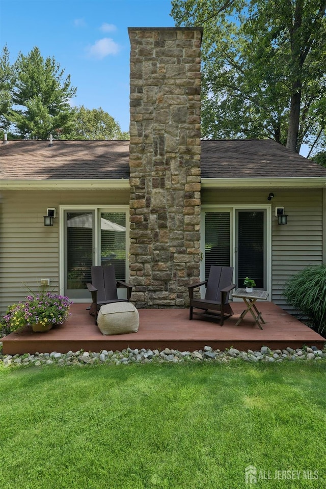 2 Derby Ln, East Brunswick, NJ 08816 - rear view of house featuring a deck, a chimney, a lawn, and a shingled roof