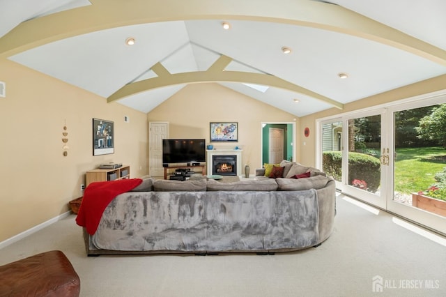 2 Derby Ln, East Brunswick, NJ 08816 - carpeted living area featuring lofted ceiling, a warm lit fireplace, a skylight, and recessed lighting