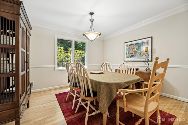 2 Derby Ln, East Brunswick, NJ 08816 - dining room with light wood-type flooring and ornamental molding
