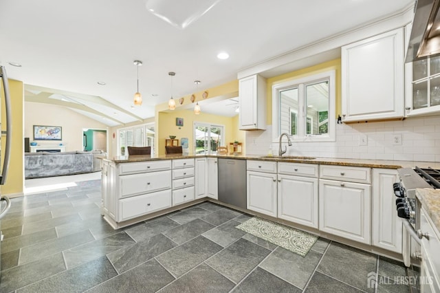 2 Derby Ln, East Brunswick, NJ 08816 - kitchen featuring stainless steel appliances, a peninsula, white cabinets, open floor plan, and stone tile floors