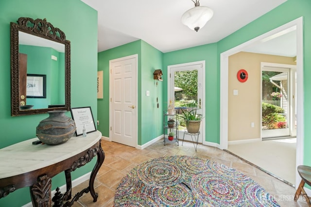 2 Derby Ln, East Brunswick, NJ 08816 - foyer with healthy amount of natural light and stone finish flooring