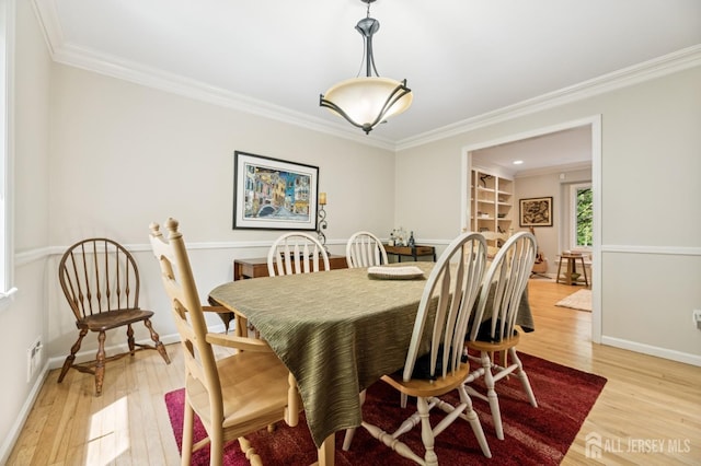 2 Derby Ln, East Brunswick, NJ 08816 - dining room featuring light wood-style flooring and ornamental molding