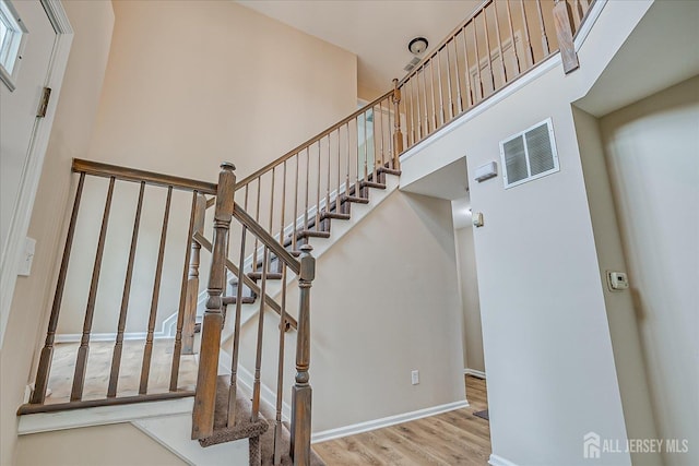 36 Benjamin Rush Ln, Princeton, NJ 08540 - stairway featuring a high ceiling and wood finished floors