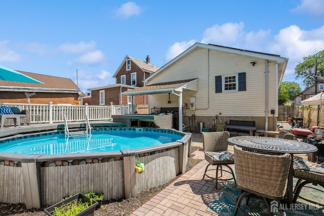 16 Taft Ave, Edison, NJ 08817 - view of swimming pool with outdoor dining area and a wooden deck