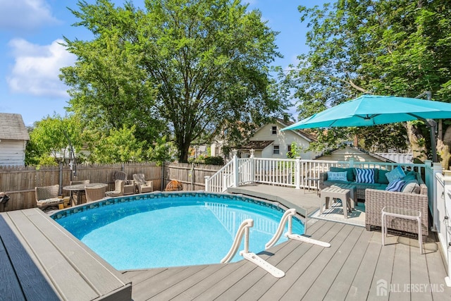 16 Taft Ave, Edison, NJ 08817 - view of swimming pool with a deck, a fenced backyard, and an outdoor living space