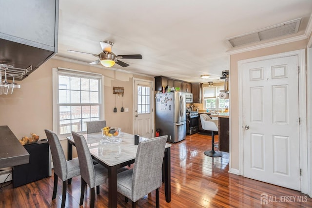 16 Taft Ave, Edison, NJ 08817 - dining area with ornamental molding, dark wood-style flooring, and a ceiling fan