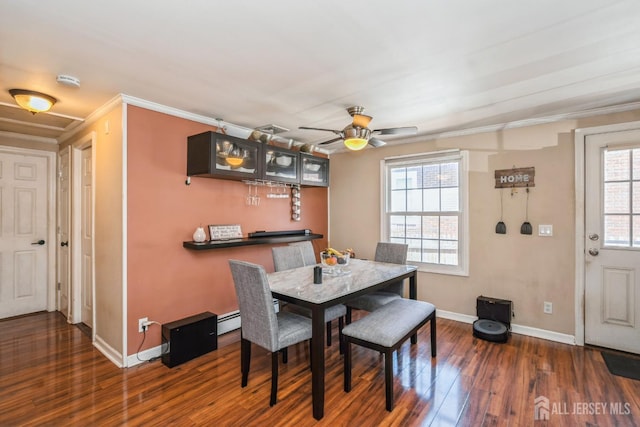 16 Taft Ave, Edison, NJ 08817 - dining space featuring wood finished floors, crown molding, a ceiling fan, and a baseboard radiator