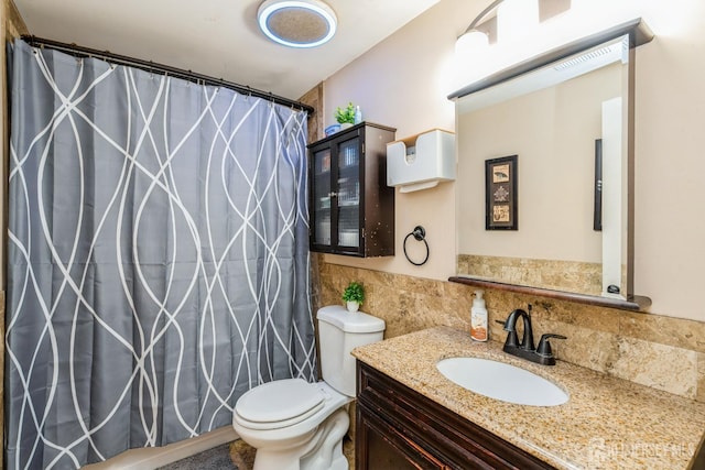 16 Taft Ave, Edison, NJ 08817 - full bath with tile walls, vanity, a shower with shower curtain, tasteful backsplash, and a wainscoted wall