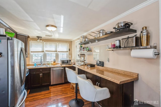 16 Taft Ave, Edison, NJ 08817 - kitchen featuring stainless steel appliances, dark brown cabinetry, dark wood-style floors, crown molding, and open shelves