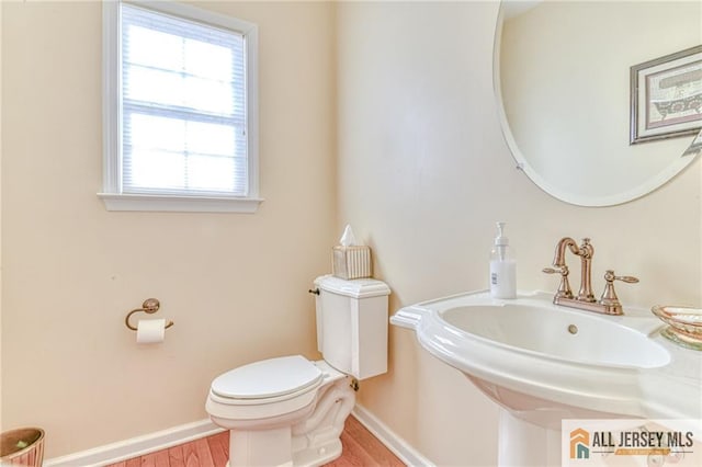 2 Kristen Ct, Franklin, NJ 08873 - half bath featuring toilet, baseboards, and wood finished floors