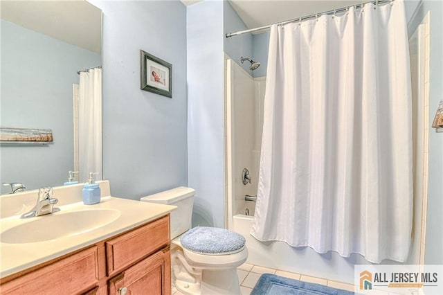 full bathroom with toilet, shower / tub combo, vanity, and tile patterned floors